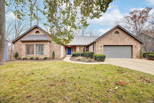 view of front of house featuring a garage and a front yard