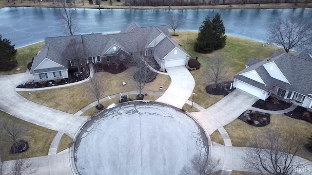 drone / aerial view featuring a water view