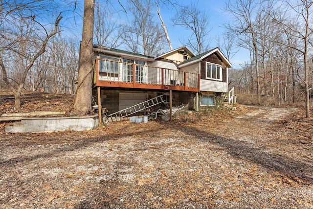 view of front of property featuring a wooden deck