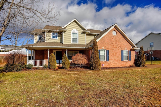 view of front of property featuring a porch and a front yard