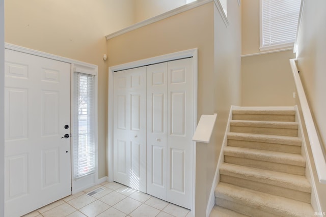 entryway featuring light tile patterned floors