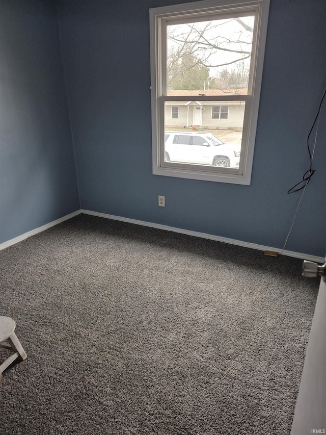 view of carpeted spare room