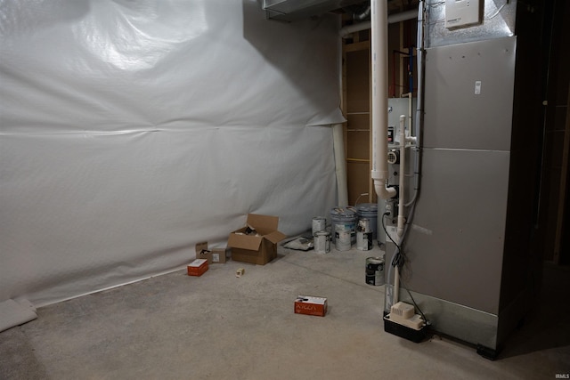 basement featuring heating unit