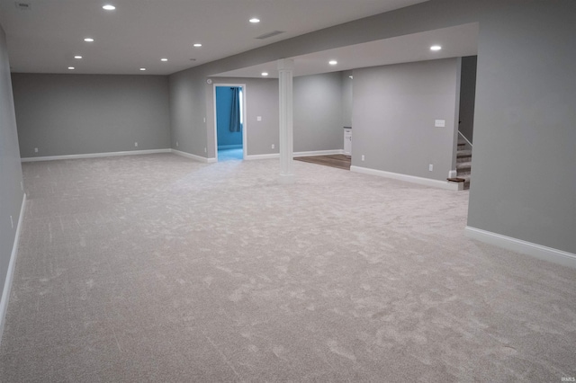 basement with light colored carpet