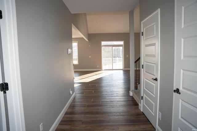 hallway with dark wood-type flooring