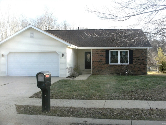 ranch-style home with a garage and a front lawn