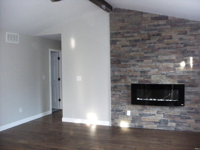 unfurnished living room with vaulted ceiling with beams and dark hardwood / wood-style flooring