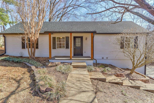 ranch-style home with a porch