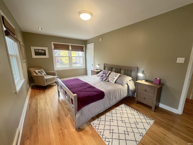 bedroom featuring light hardwood / wood-style flooring