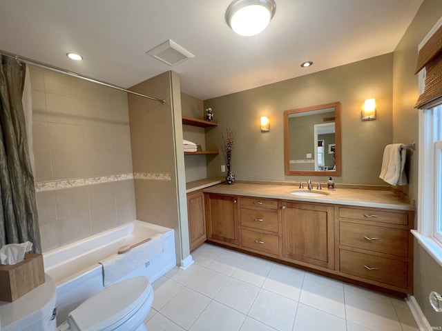 full bathroom featuring vanity, shower / tub combo, tile patterned floors, and toilet