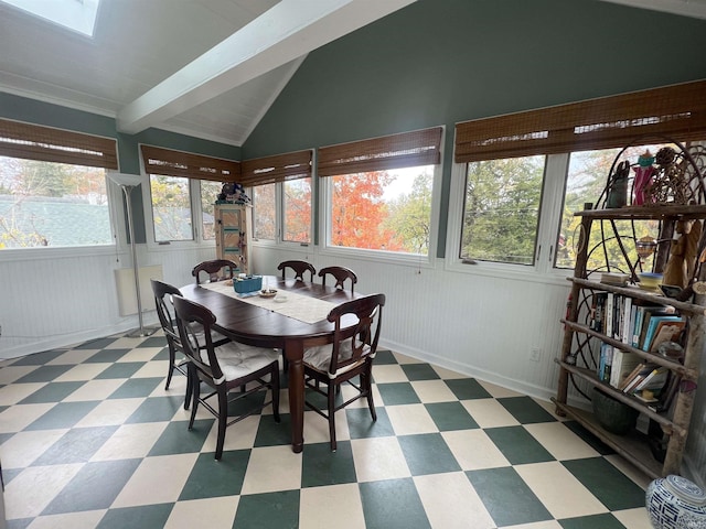 sunroom / solarium with lofted ceiling with skylight