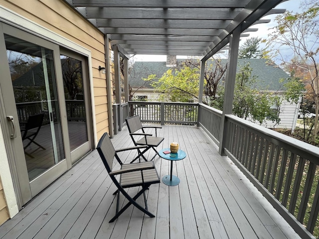 wooden terrace featuring a pergola