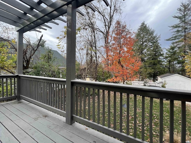 wooden terrace featuring a pergola