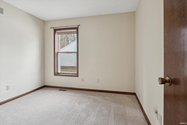 view of carpeted spare room