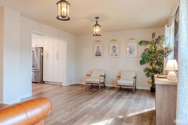 living area featuring light hardwood / wood-style floors