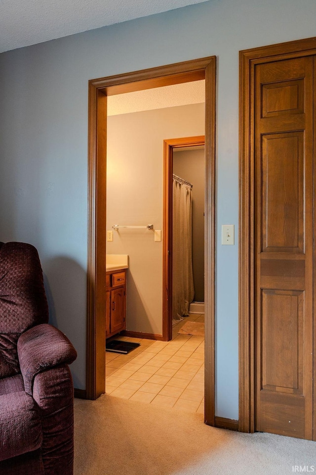 interior space featuring tile patterned flooring and vanity