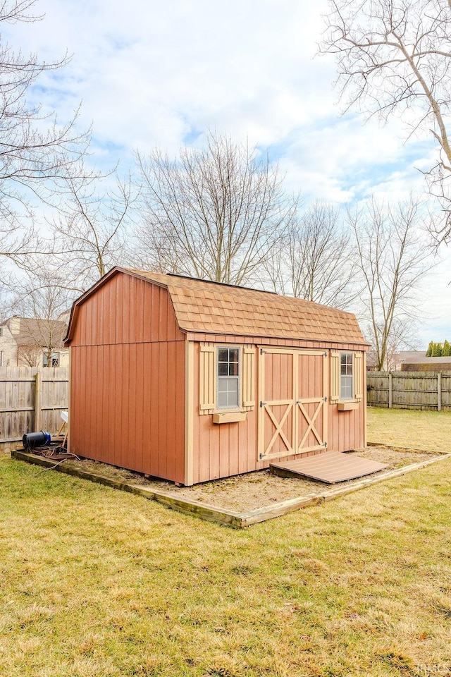 view of outdoor structure with a yard