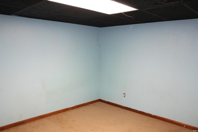 unfurnished room featuring carpet