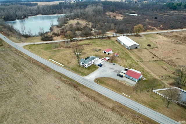 drone / aerial view featuring a rural view and a water view