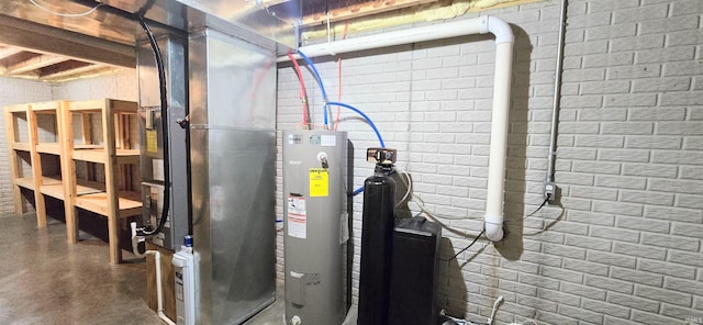 utility room featuring heating unit and water heater