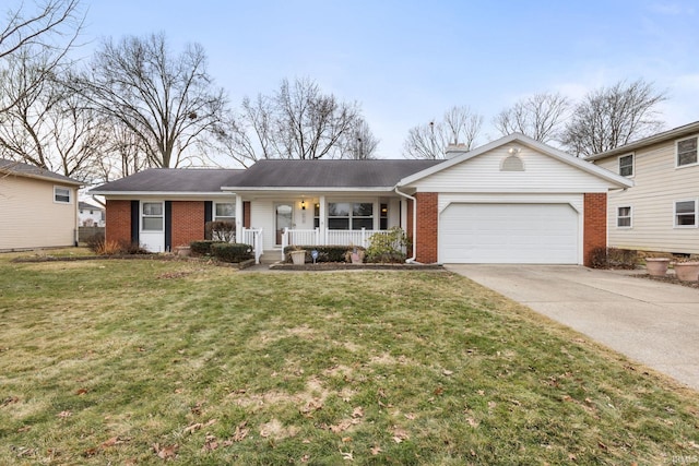 ranch-style house featuring a garage, a front yard, and covered porch