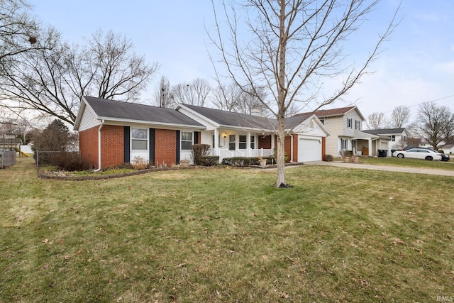 view of front facade with a garage, a porch, and a front lawn