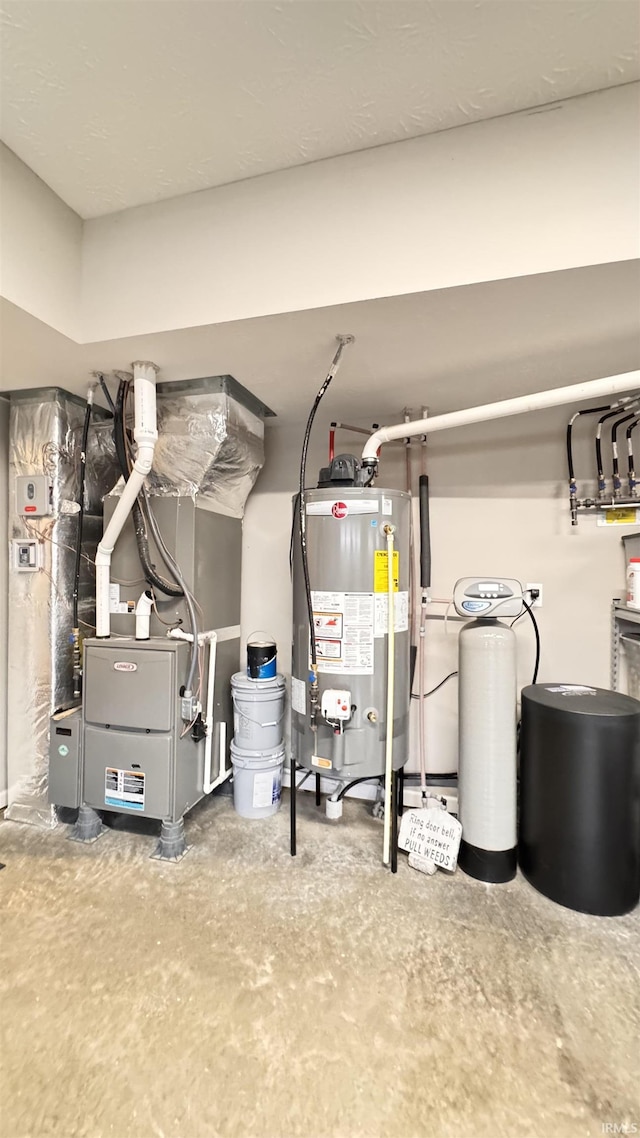 utilities featuring gas water heater and heating unit