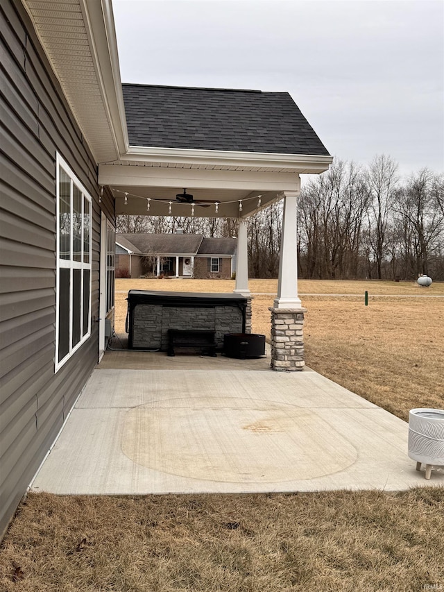 view of patio with ceiling fan