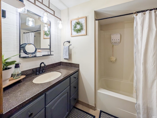 bathroom featuring vanity and shower / bath combo with shower curtain