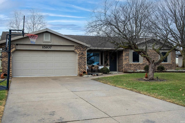 ranch-style house featuring a garage and a front lawn