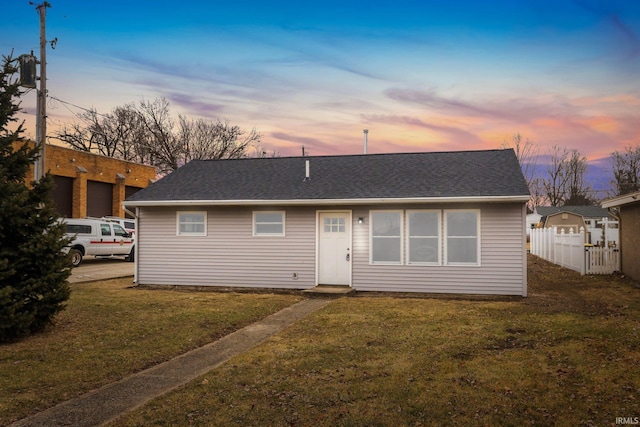 view of front of home featuring a yard