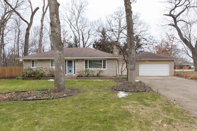 ranch-style house featuring a garage and a front yard