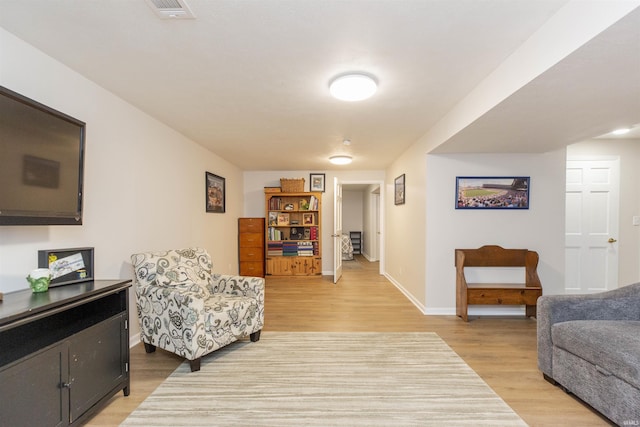 living room featuring light wood-type flooring