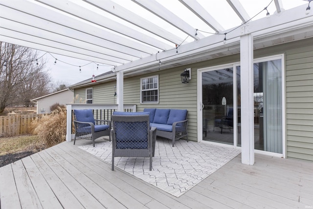 wooden deck featuring an outdoor living space and a pergola