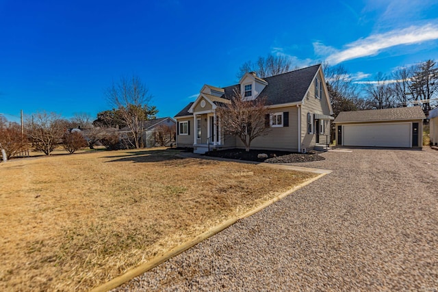 view of front of property featuring a garage and a front lawn