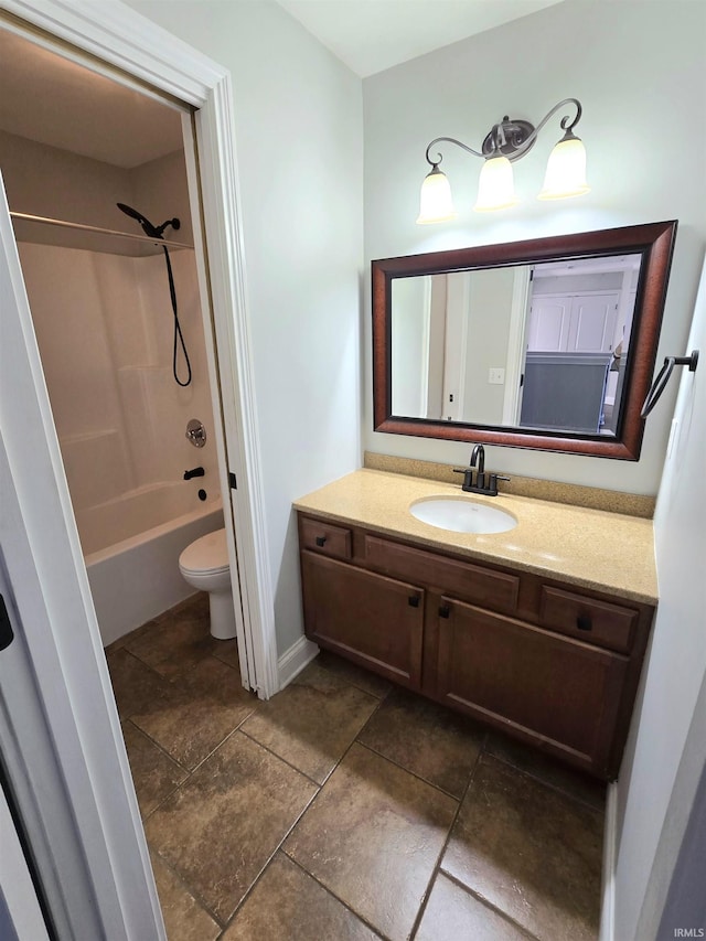 full bathroom featuring shower / bath combination, vanity, and toilet