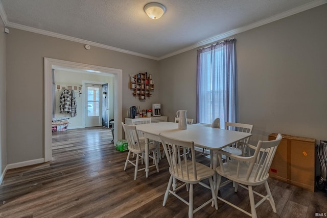 dining area with crown molding, a textured ceiling, and dark hardwood / wood-style flooring