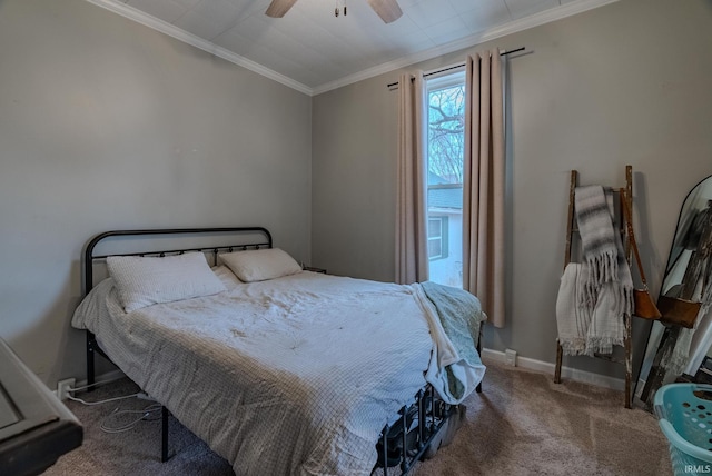 carpeted bedroom with crown molding and ceiling fan