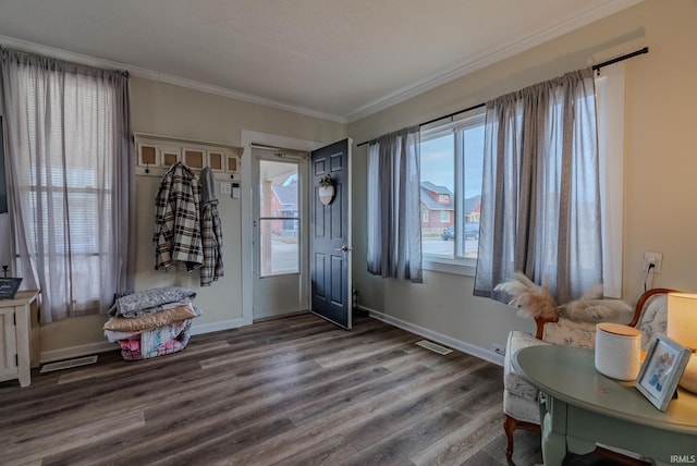 interior space with crown molding and dark hardwood / wood-style floors