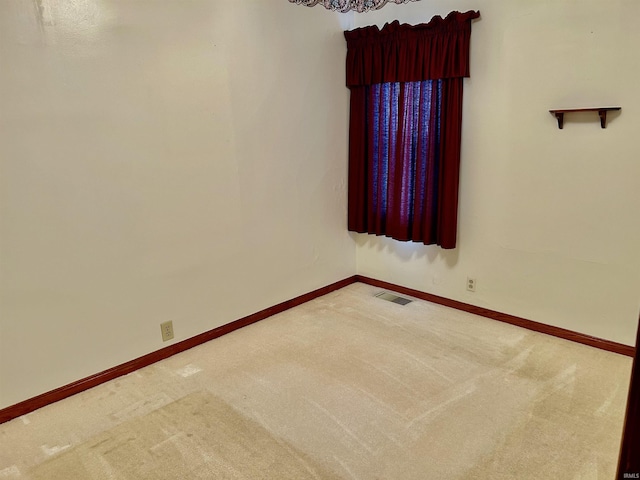 view of carpeted spare room