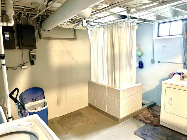 interior space featuring washer / dryer and concrete floors