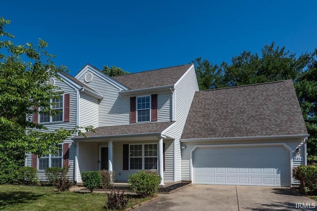 view of front of property with a garage