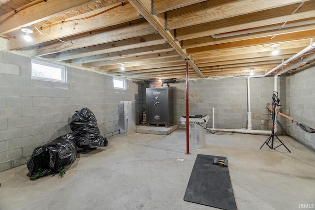 basement featuring heating unit