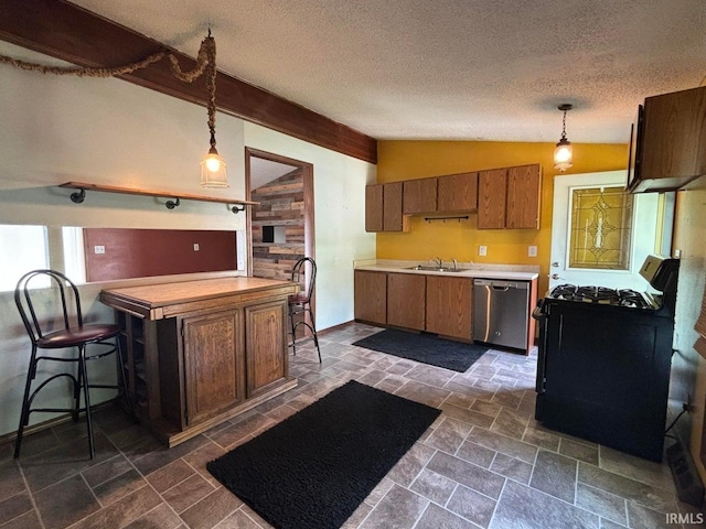 kitchen with lofted ceiling, sink, decorative light fixtures, a textured ceiling, and dishwasher