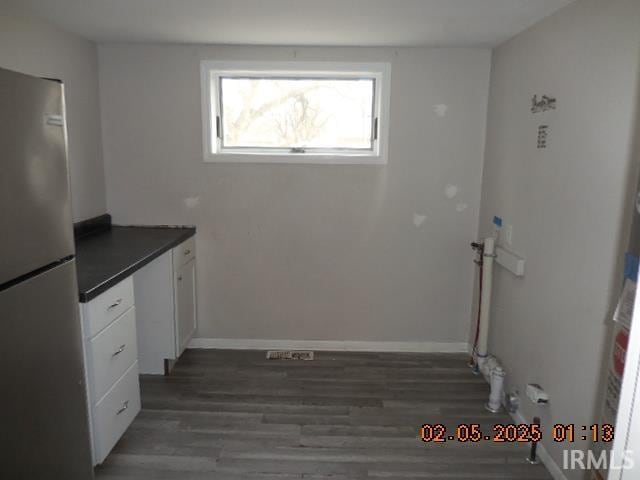 washroom with dark hardwood / wood-style floors