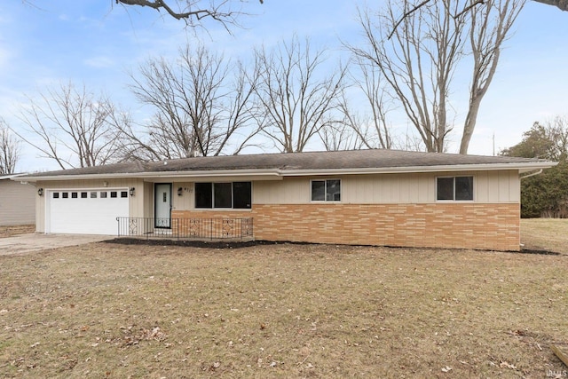 single story home featuring a garage and a front yard