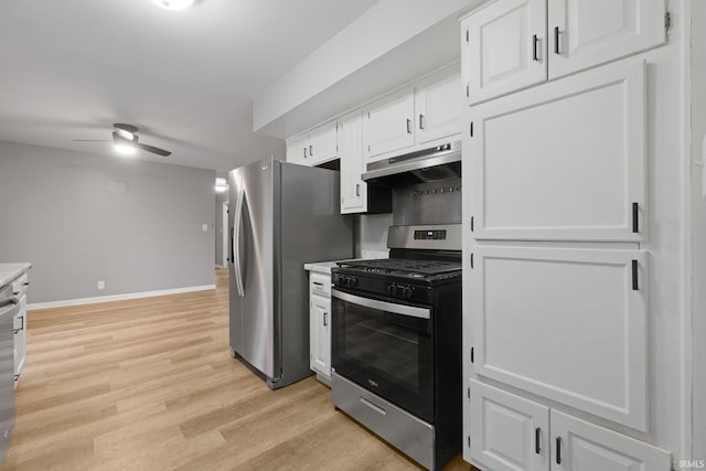 kitchen featuring white cabinetry, appliances with stainless steel finishes, light wood-type flooring, and ceiling fan