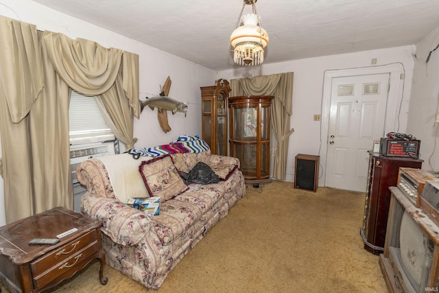 living room with an inviting chandelier and light colored carpet