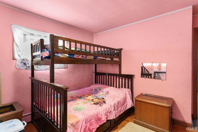 bedroom featuring hardwood / wood-style floors