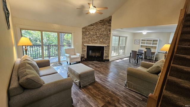 living room with ceiling fan, high vaulted ceiling, dark hardwood / wood-style floors, and a fireplace